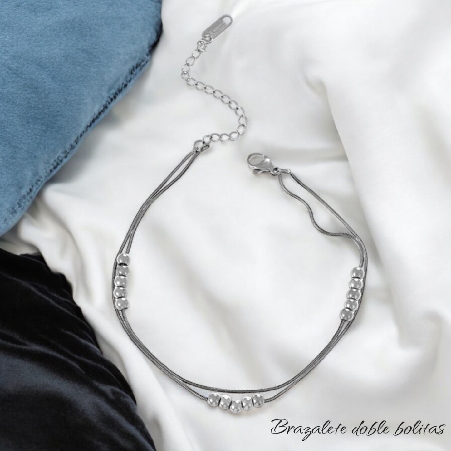 Brazalete doble bolitas