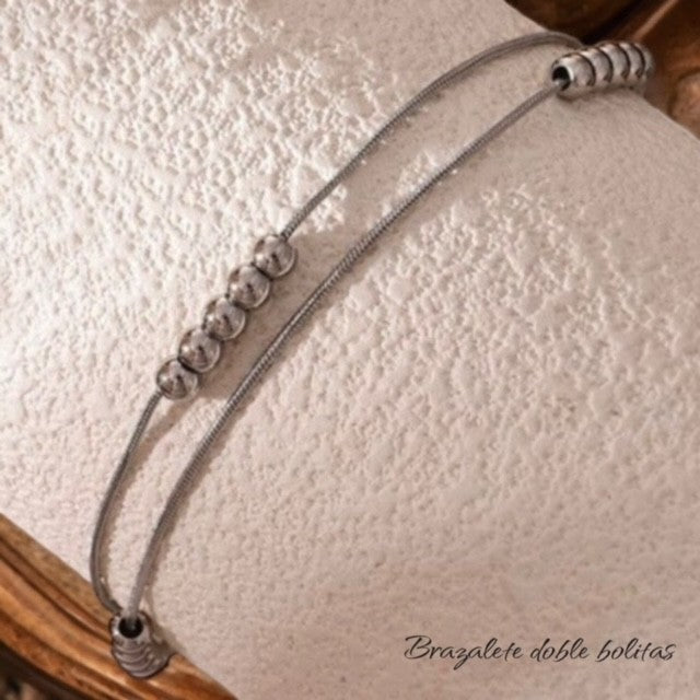 Brazalete doble bolitas