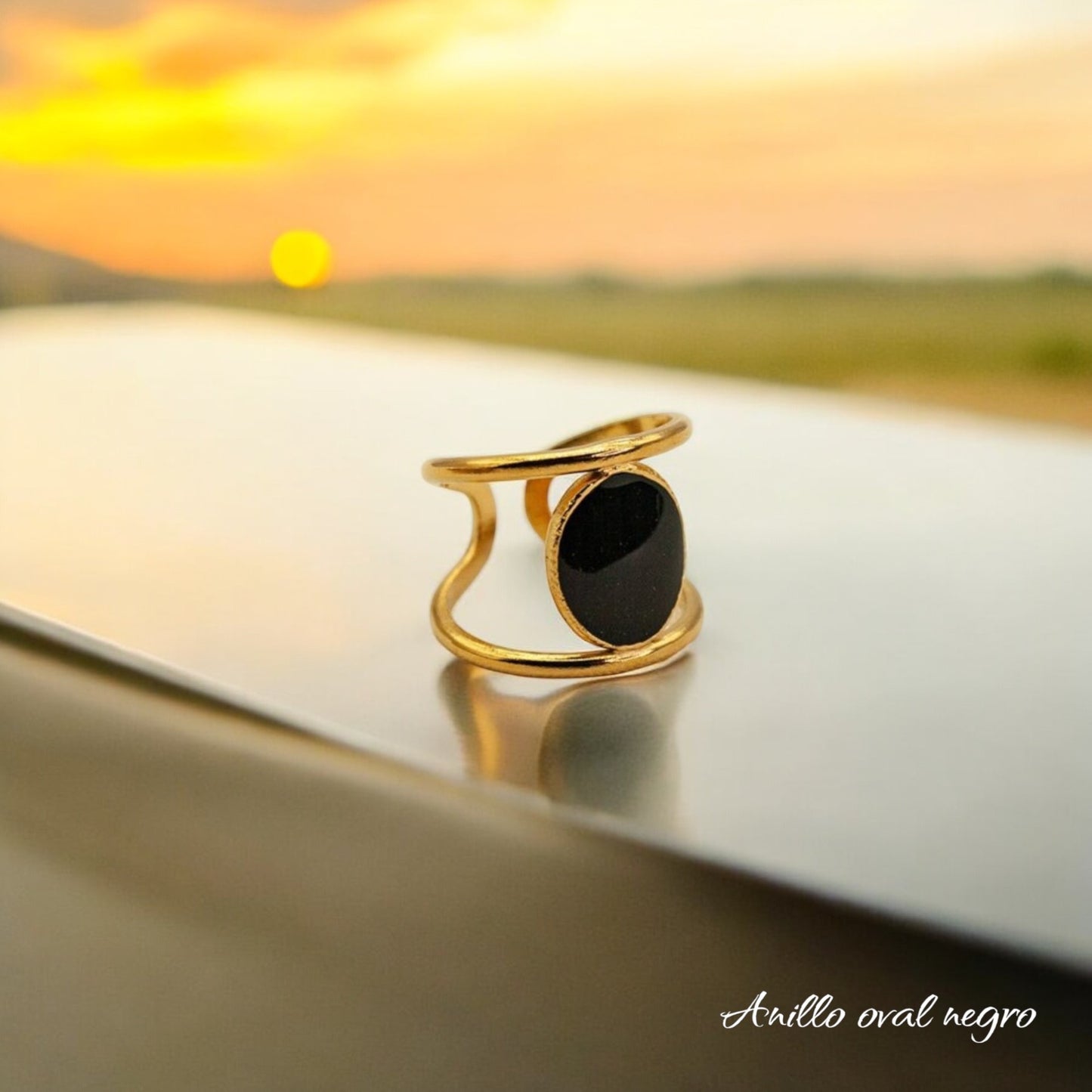 Anillo oval negro